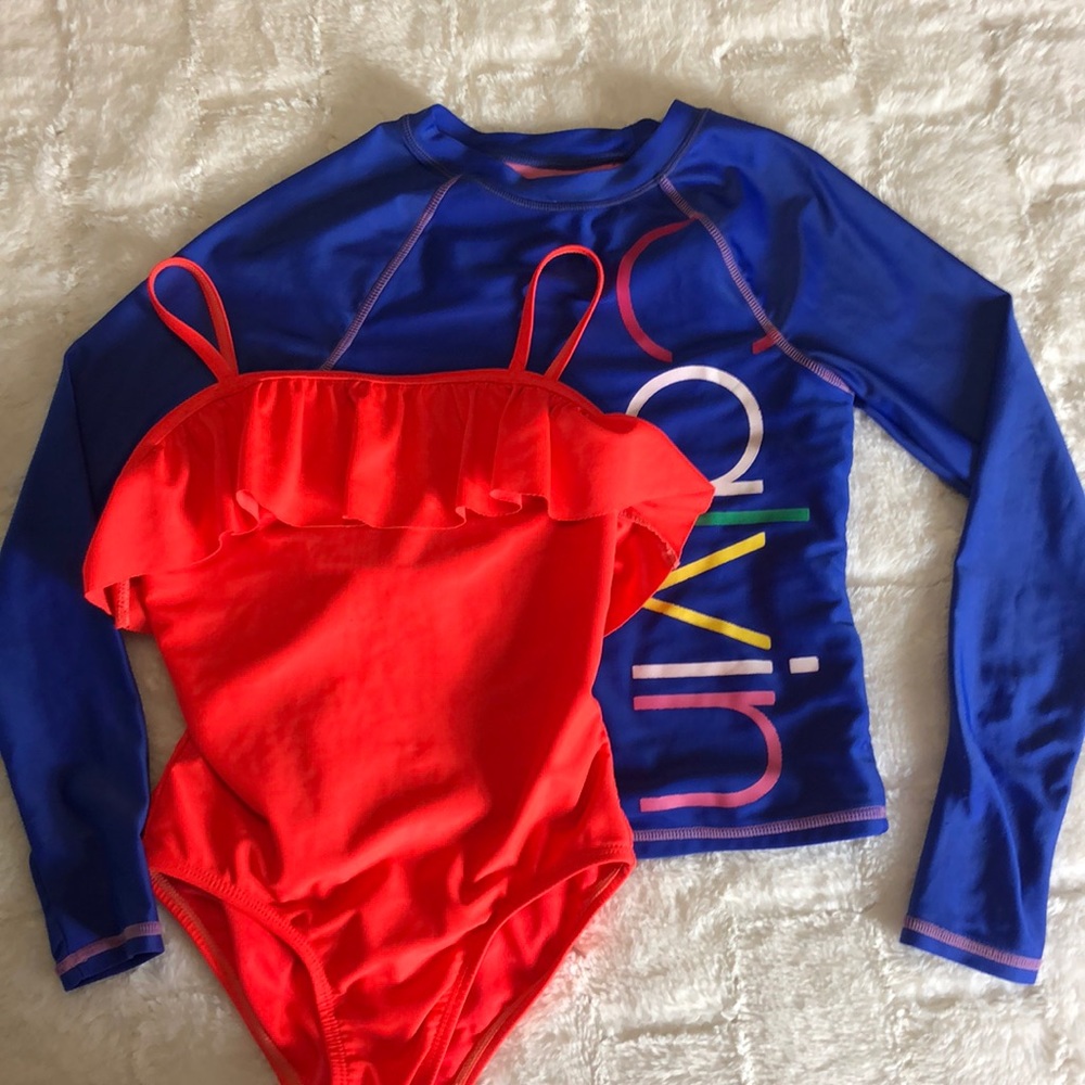 Used girls one piece swimsuit and rash guard